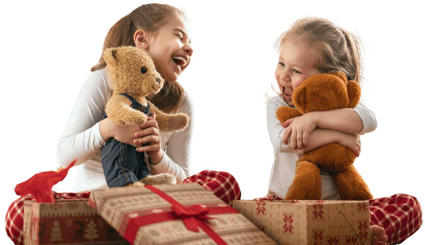 Girls smiling from presents and gifts holidays